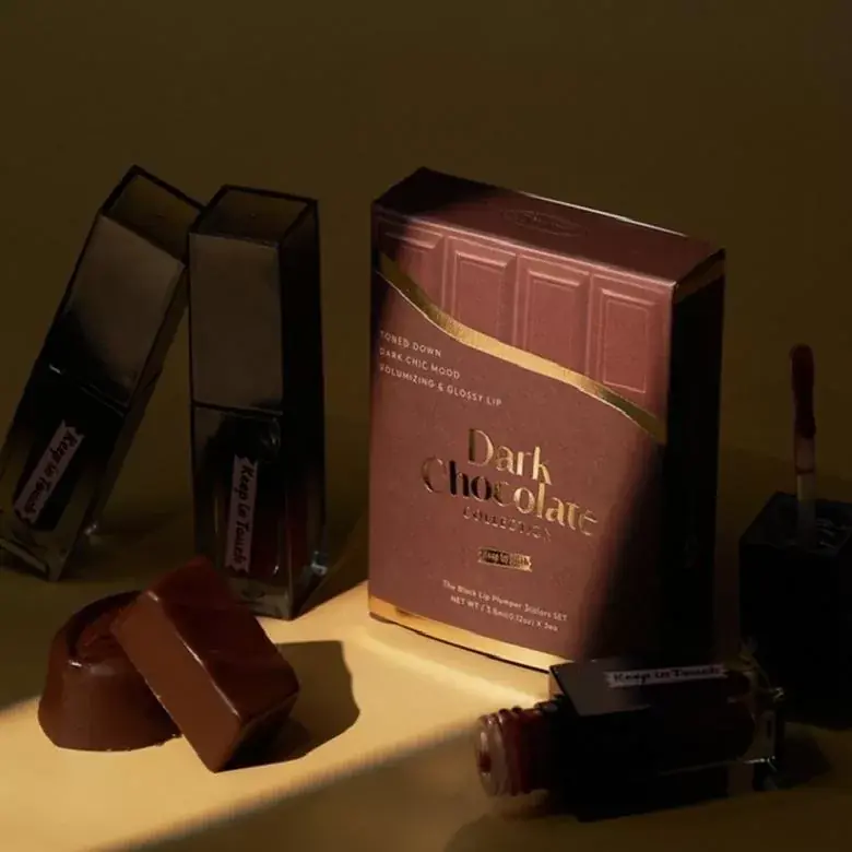 Rendeld meg most Keep In Touch The Black Lip Plumper Ajak Tint Dark Chocolate Kollekció Csomag ( Sweet Romance, Melo Drama, Royal Midnight)